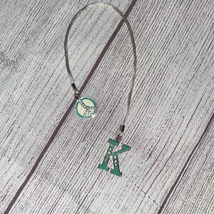 Monogram decorative K charm w/peace sign green & silver colors